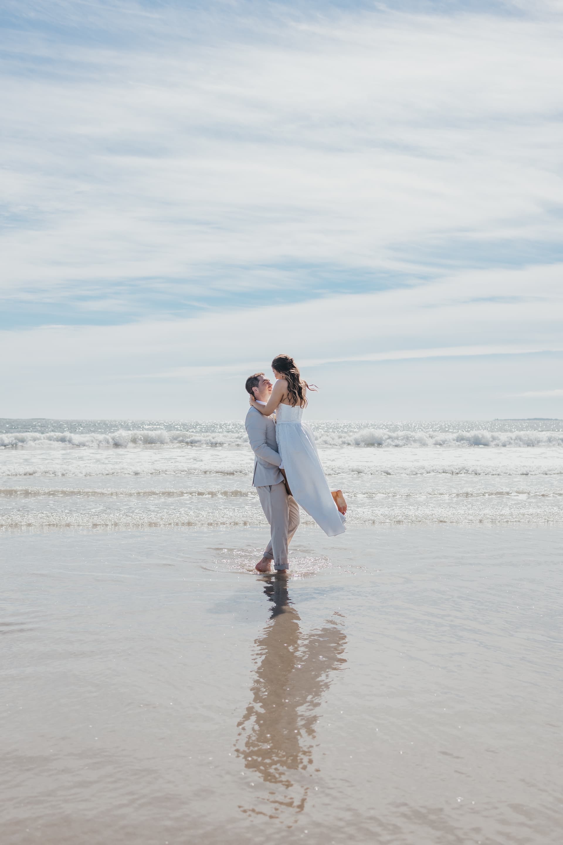Maine Reason Photography - Beautiful beach family portrait session capturing authentic moments in Maine's stunning natural landscape